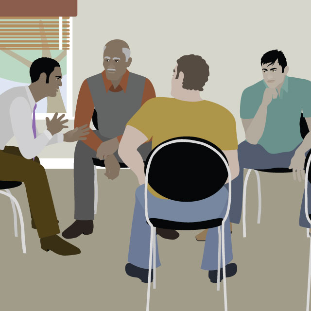 group of men in a discussion circle