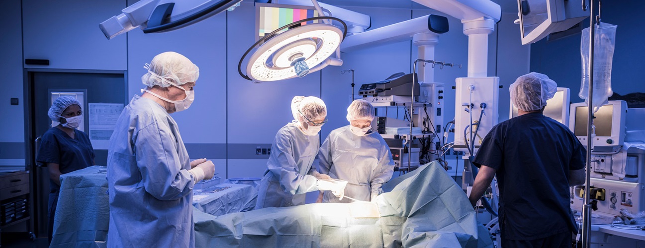a medical team in an operating room performing surgery