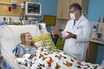 Ashley with Dr. George Jallo at Johns Hopkins All Children's