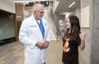 Annabelle with James Quintessenza, M.D., at Johns Hopkins All Children's Hospital