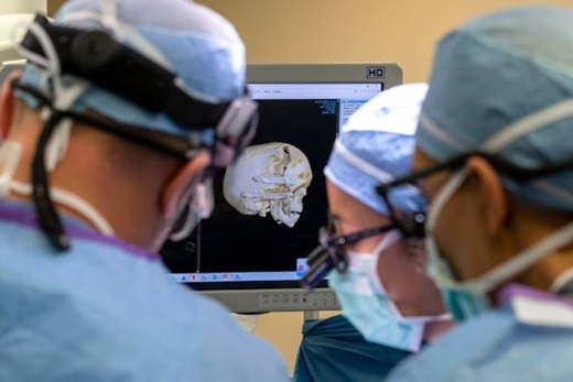 Doctors performing craniofacial reconstruction at All Children’s Hospital