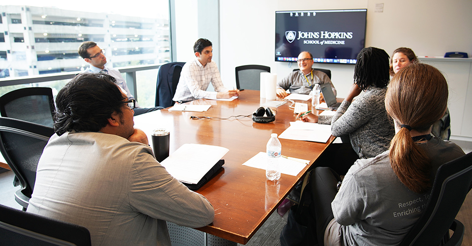 Attendees in a conference room