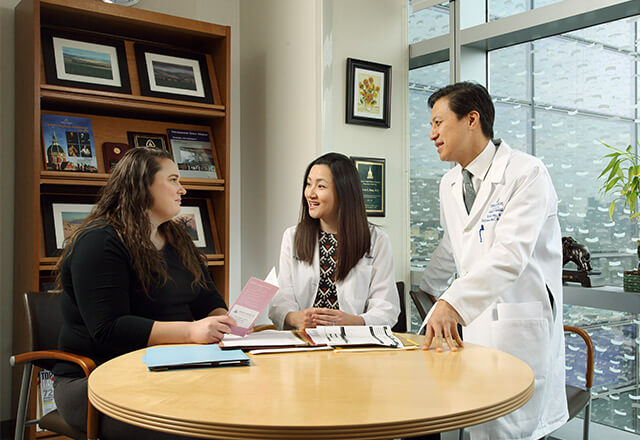 Female patient speaking with Dr. Hong