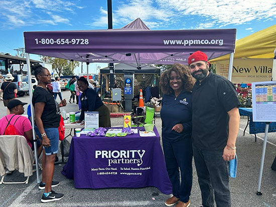 Dr. Everett and Chef Giacomo at Priority Partners Table at the Kunta Kinte Heritage Festival