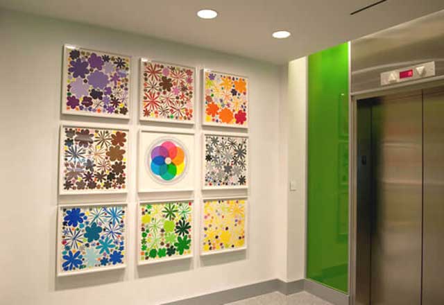 an art display of a grid of nine works
