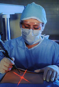 Picture of a surgeon preparing to do laser surgery