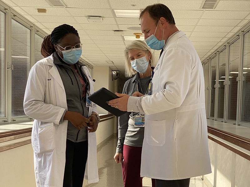 Mihail Zilbermint M.D., M.B.A., Precious Ohagwu, PharmD, and Lee Ann Alexander, RPh, BCGP, among other specialists working with patients in the DSMT program
