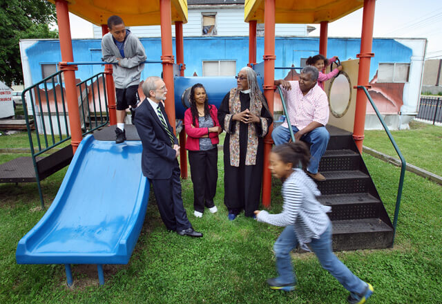 Community members on a playground
