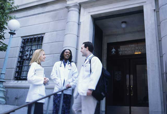 Medical students standing outside the Welch Medical Library