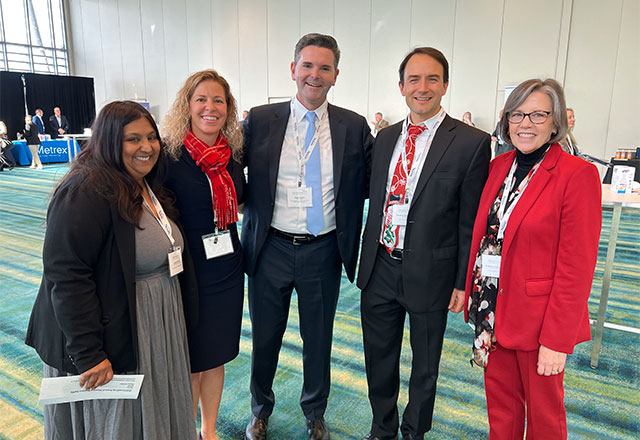 Photo of Matt Austin, Angela Green, Stacy Shilling and others at the 2024 Leapfrog Annual Meeting.