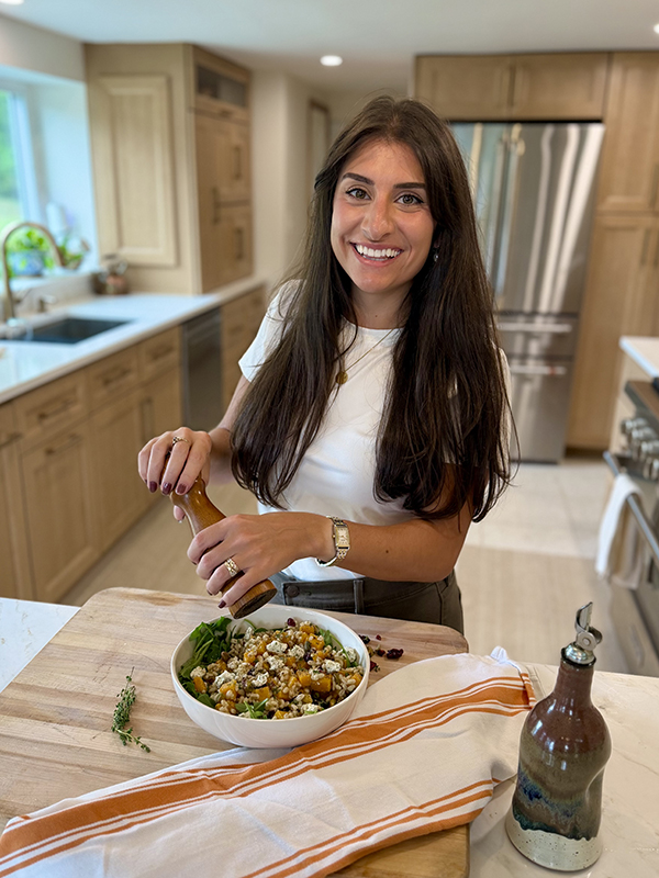 nutritionist posing with salad
