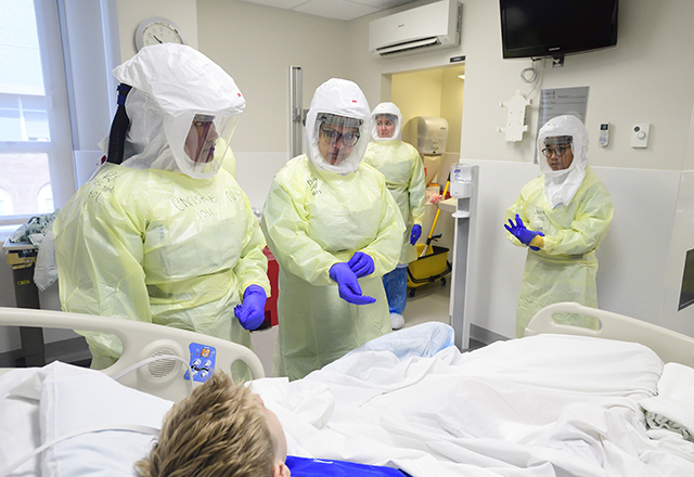 Staff doing a drill with suit on. 