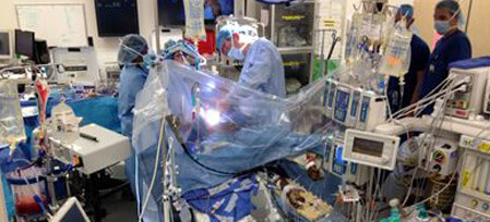 Operating room, with surgeons operating