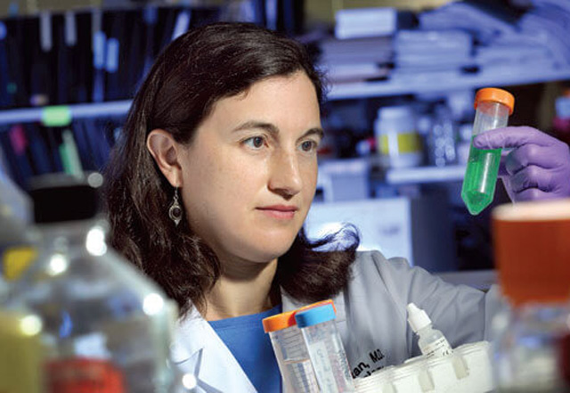Researcher with test tube