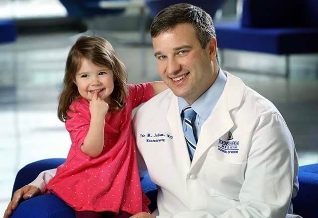 Dr. Eric Jackson with a patient