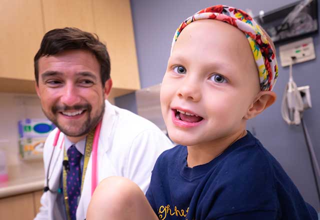 Dr. Ladra with a patient