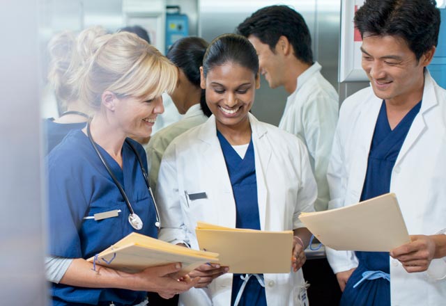 Group of providers looking at folders