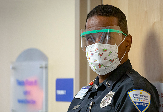 Hospital security staff wearing PPE