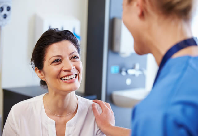 woman talking to her doctor