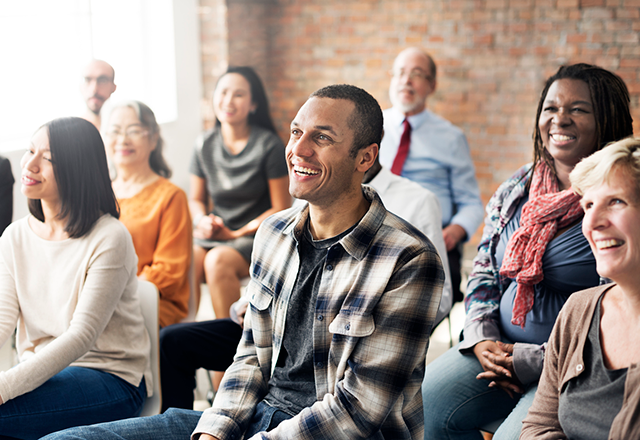 people sitting down in a learning space