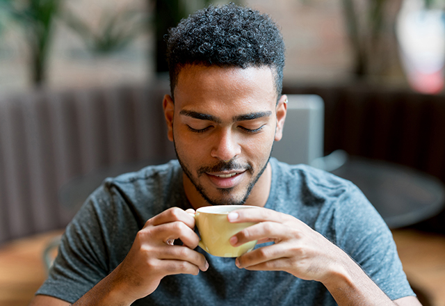 man drinking coffee