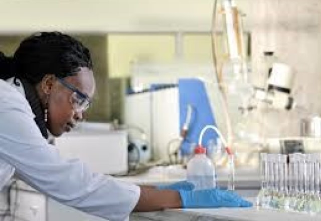 researcher with test tubes