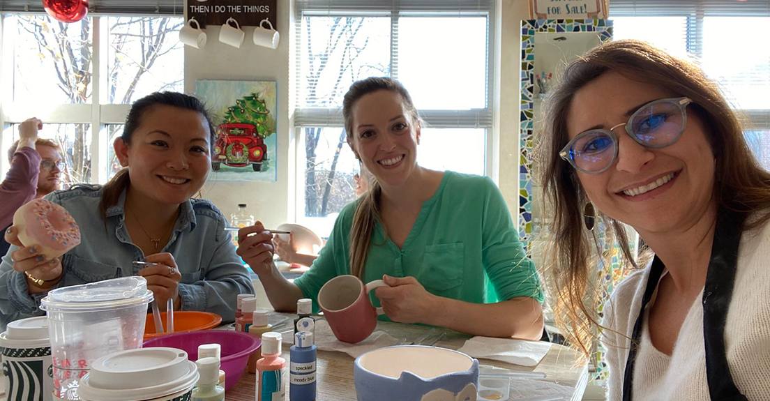 Fellows painting pottery