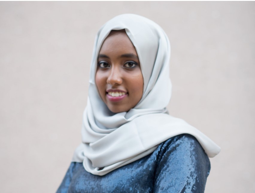 Rinas Osman smiles for a photo