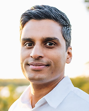 Ravi Gupta smiles for a photo.