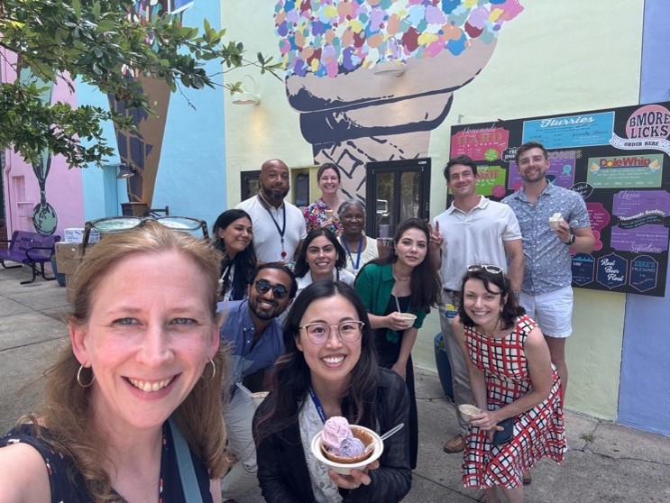 group of men and women getting ice cream