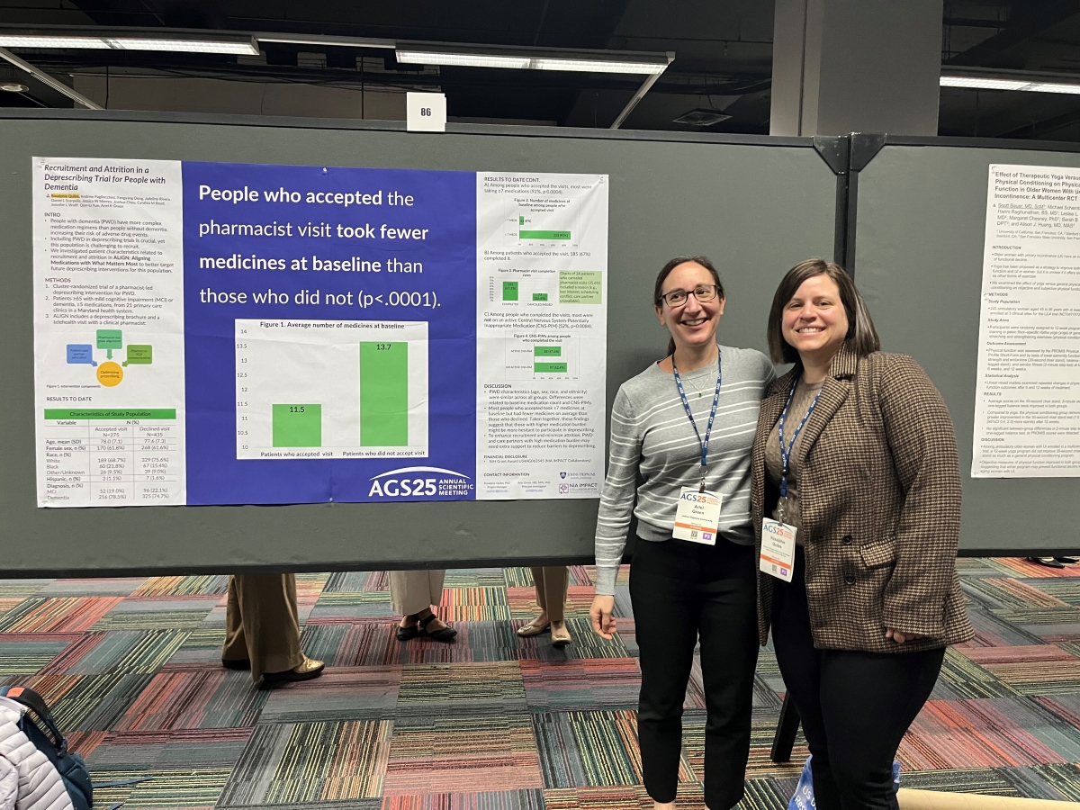 two female doctors at a poster session