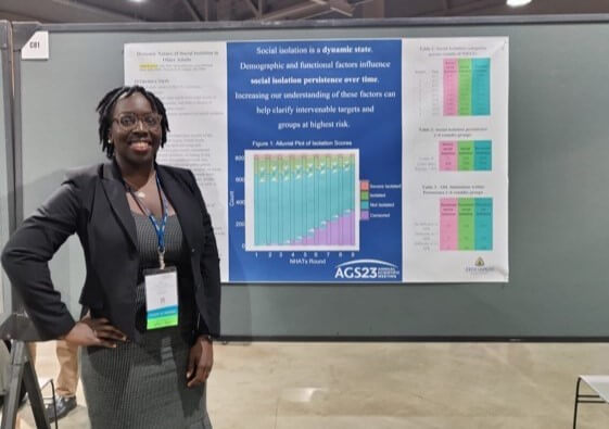 female doctor presenting research poster