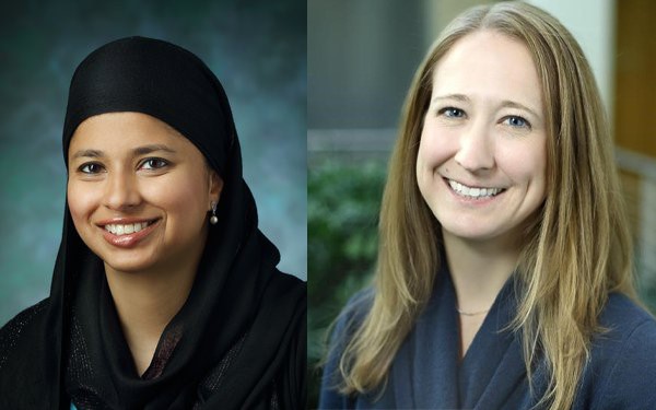 two female doctors smiling