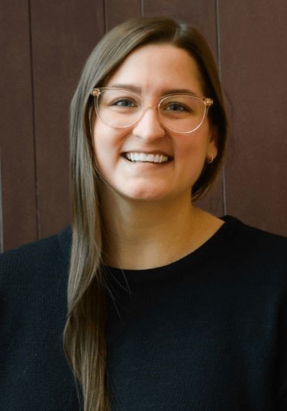 female doctor in glasses smiling