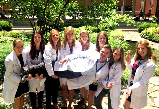 resident group in white coats