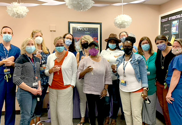 Doctors and Fellows stand together