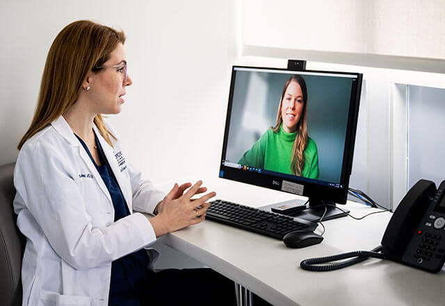 doctor Moragianni talks to patient on video call