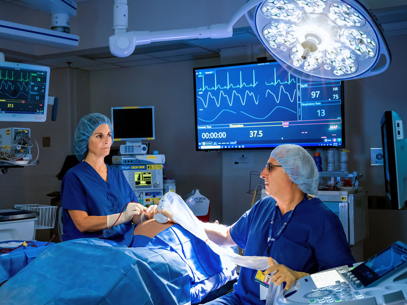 Dr. Michelle Kush and Dr. Ahmet Baschat perform fetal blood transfusion