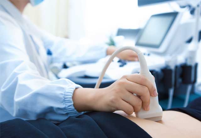 ultrasound exam during the first trimester of pregnancy