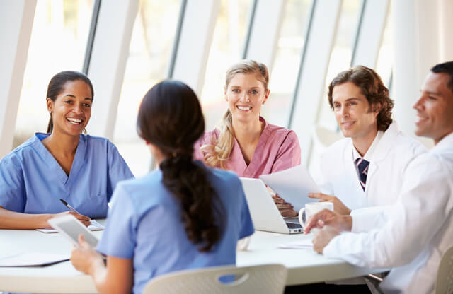 medical team gathers to talk