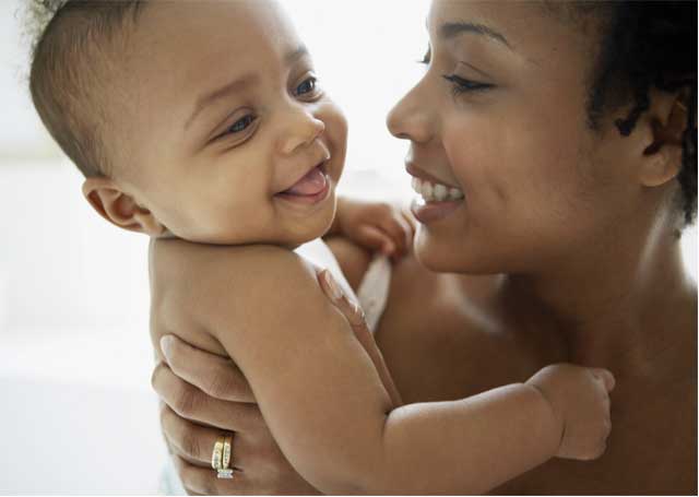 mother holding her baby