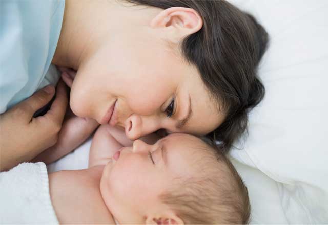 mother looking at baby