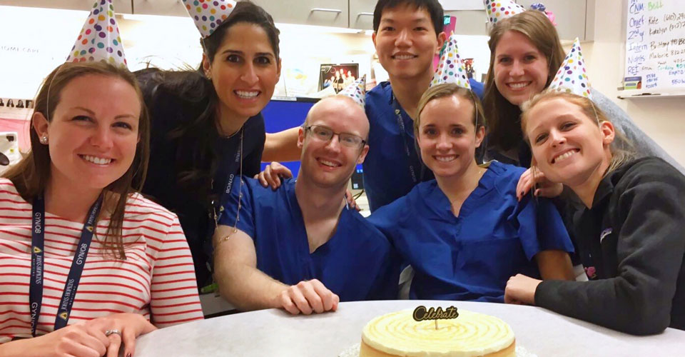 Residents celebrating a birthday with cake