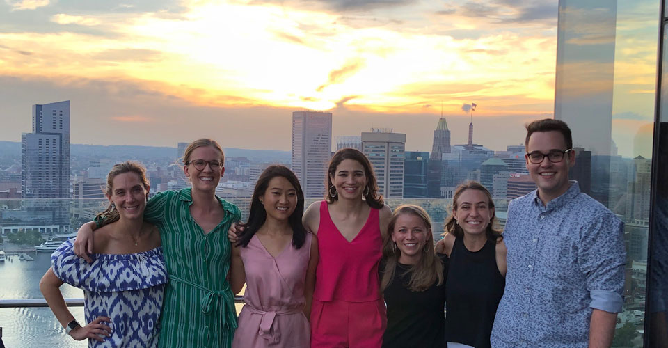 Residents in front of the Baltimore skyline