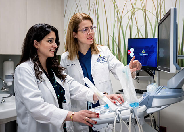 two doctors observe imaging