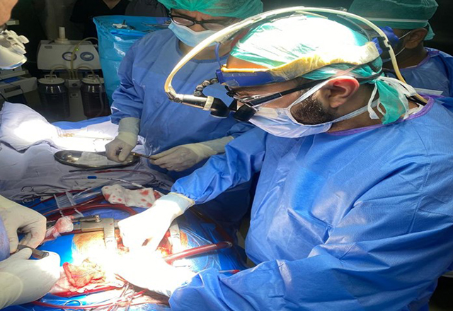 Hamza Aziz, M.D., performing coronary artery bypass surgery in Lahore, Pakistan.