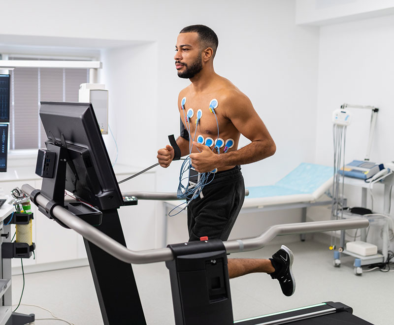 a man runs on a treadmill during a stress test