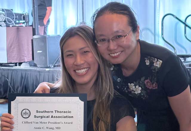 Annie Wang receiving the Clifford Van Meter President’s Award