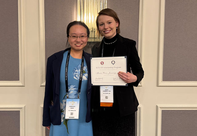 Maria Jennings (right) receiving the Women in Thoracic Surgery Scholarship
