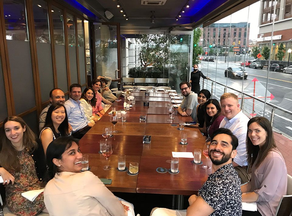 a group of fellows out to eat in Harbor East